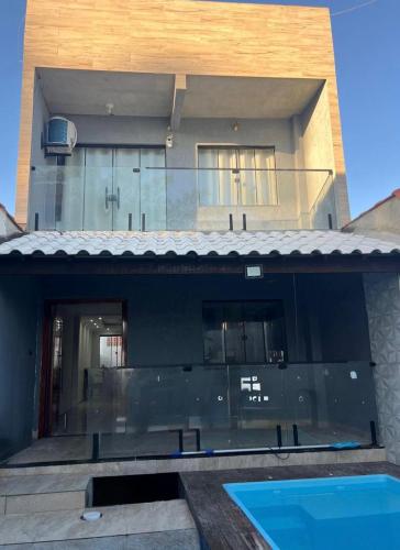 Casa pé na areia com piscina e churrasqueira – khách sạn tại Suns Village