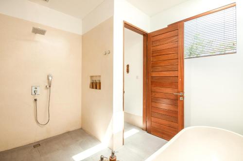 Exquisite 4BR Haven 5min Stroll to Beach Canggu - image 4