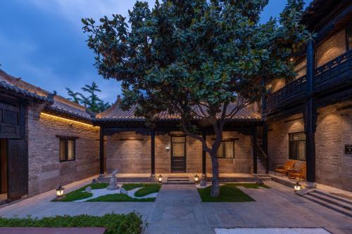 Vista exterior, Manxin Hotel Qingdao Xindu in Sifang
