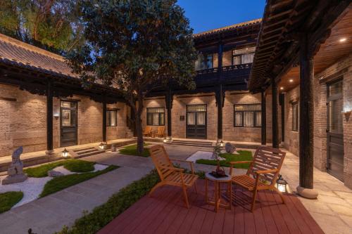 Vista exterior, Manxin Hotel Qingdao Xindu in Sifang