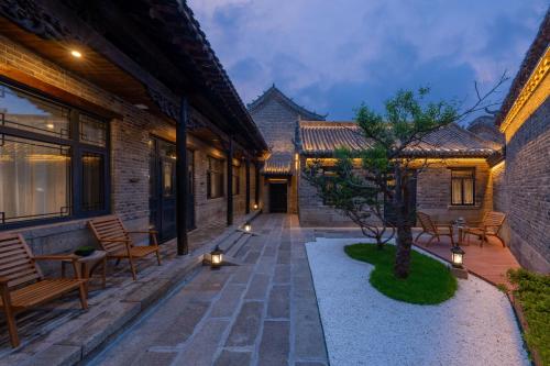 Vista exterior, Manxin Hotel Qingdao Xindu in Sifang
