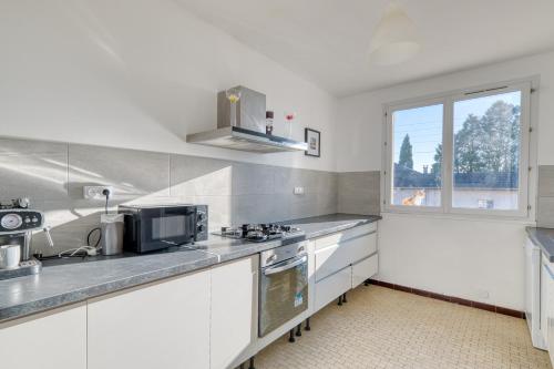 Le Repaire des Travailleurs - Balcon Privé - Jonage (Le Repaire des Travailleurs - Balcon Prive - Jonage) in Jonage