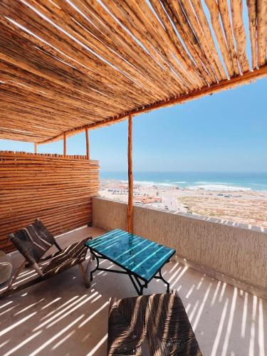 View, Aman surf paddle yoga in Imsouane