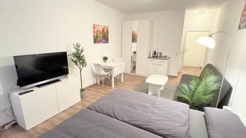 Modern, quiet apartment right by S-Bahn - close to Munich & airport in 下施萊斯海姆