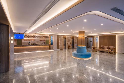 Vestíbulo, Manxin Hotel Qingdao Xindu in Sifang