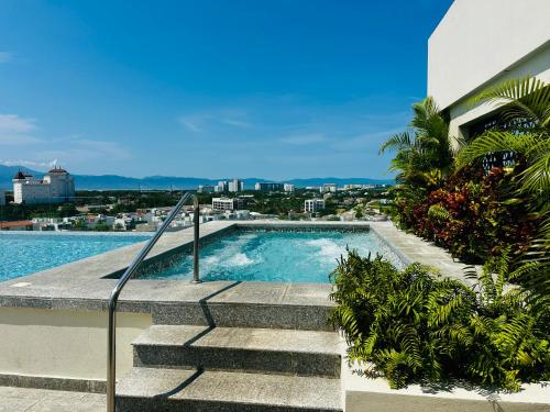 Peldbaseins, Luxury Condo en Nuevo Vallarta Alberca Tipo Resort in Jarretaderas
