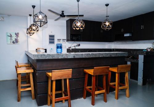 Kitchen, RedDoorz @ Kopinos Tourist Inn Hotel in Del Carmen