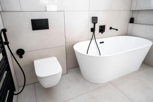 Vannas istaba, Boutique hotel Vila Mudaj in Hubova