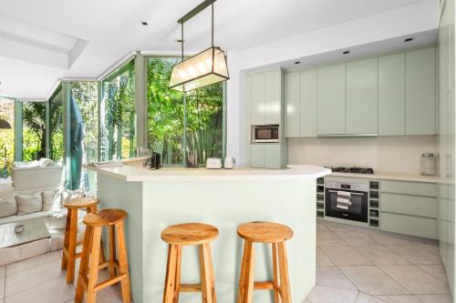 Sunlit Glasshouse Oasis with Private Pool in Double Bay