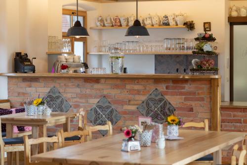 餐廳, Kaffeekandl Café & Pension (Kaffeekandl Cafe & Pension) in 格隆