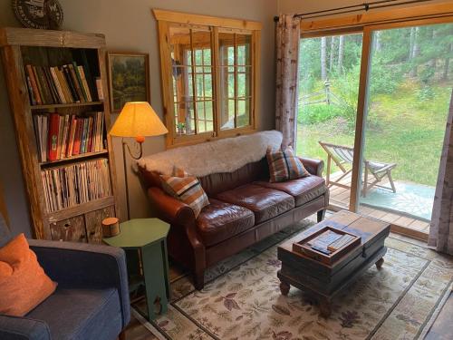 . Cabin in the woods with fire pit and porch