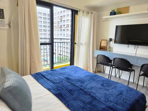 Bed, Sapphire Suite at Amani Grand in Cabantian