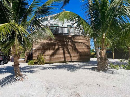 Charming Beachfront Cottage with Dock Slip and Kayaks on Little Gasparilla Island | Placida, FL in Placida