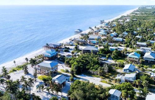 Charming Beachfront Cottage with Dock Slip and Kayaks on Little Gasparilla Island | Placida, FL in Placida