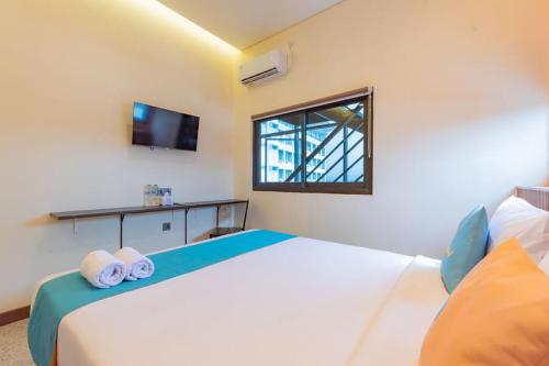 Sans Hotel Suryakencana Bogor Room Type - Deluxe Room
