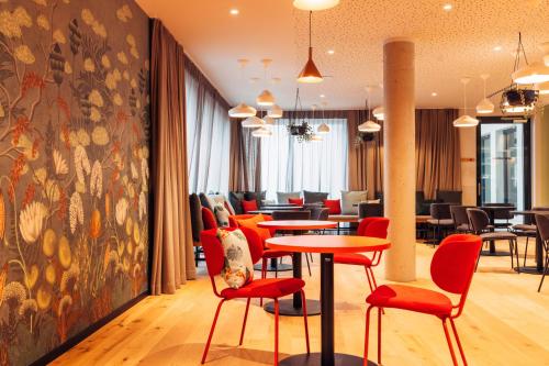 Ресторан, harry's home Villach hotel & apartments in Філлах