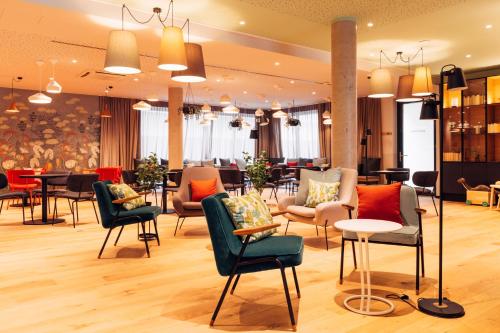 Ресторан, harry's home Villach hotel & apartments in Філлах