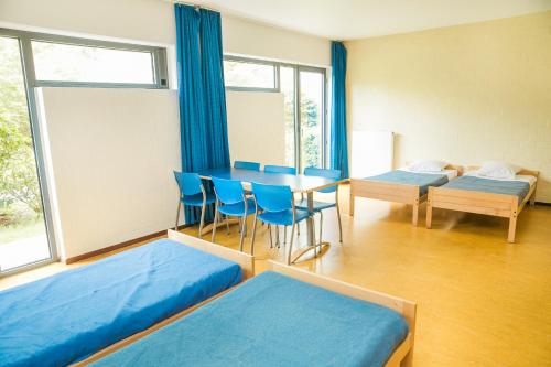 Bed in Male Dormitory Room image 3