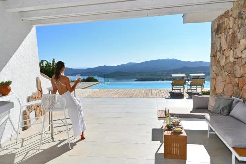 Suite deluxe in Villa Amaca angolo di paradiso con piscina riscaldata e sauna a raggi infrarossi, Arzachena