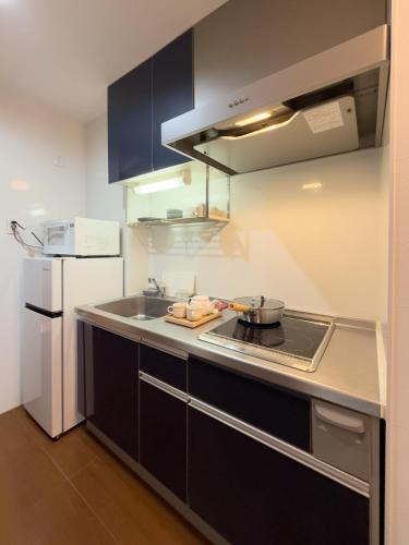 ISSHUKU NOMA池袋II 105 - Quad Room