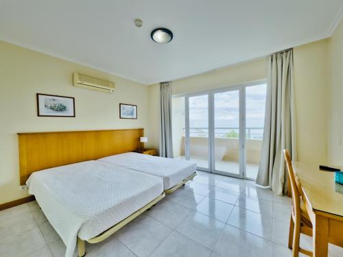 포르티망 Apartamentos Jardins da Rocha 5성급 게스트하우스 스위트룸