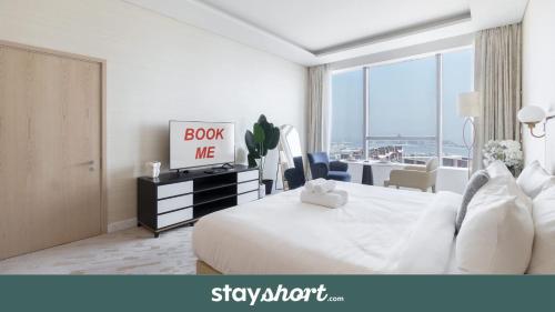 StayShort - Palm Jumeirah Sleeps 2 with Amazing Sea Views!, Dubaj