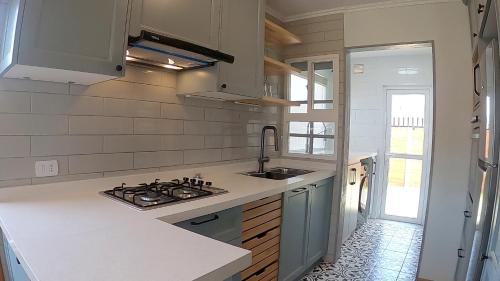 Cocina, Sweet Frutillar Hostel in Frutillar