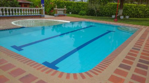 Finca Piscina Playita Kiosco Bar Combia - Estación Pereira (Finca Piscina Playita Kiosco Bar Combia - Estacion Pereira) in 벨몬테 바호
