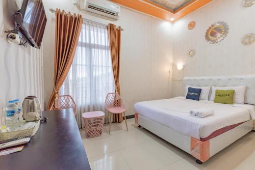 Urbanview Hotel Rifal Home Tegal