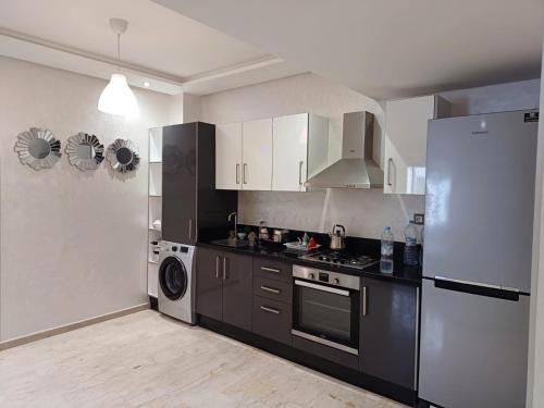 Kitchen, Apartment kamal park E21 in Mohammedia