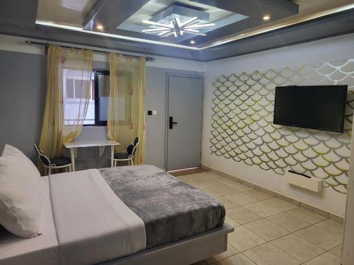 . Ndouha House