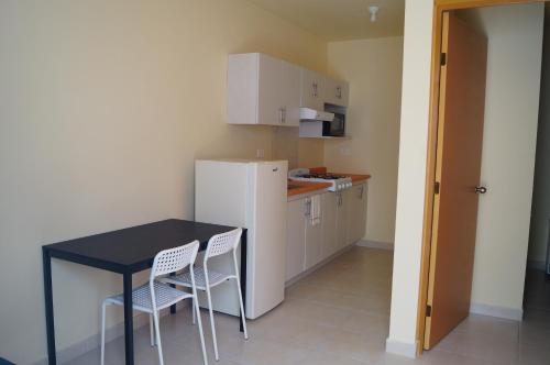 MV Suites - 주방
