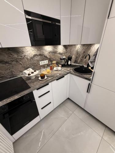 Instalações, JE downtown suite in Jelgava