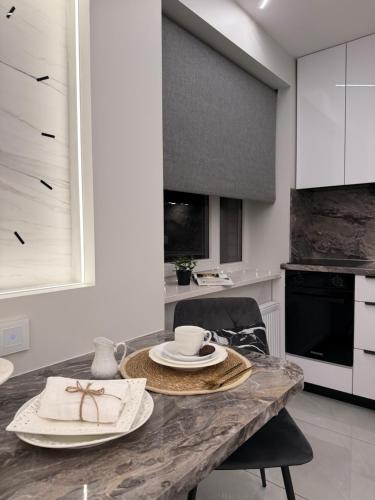 Cozinha, JE downtown suite in Jelgava