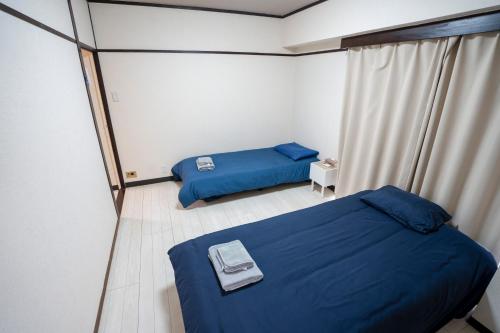 101Room,10-minute walk from Kita-Ikebukuro Station Spacious two-bedroom apartment with kitchen Sleeps up to 5 people