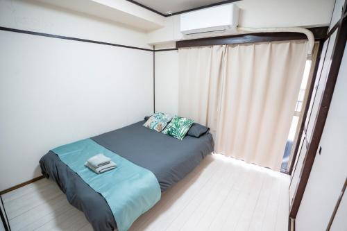101Room,10-minute walk from Kita-Ikebukuro Station Spacious two-bedroom apartment with kitchen Sleeps up to 5 people