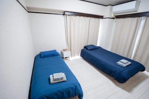 101Room,10-minute walk from Kita-Ikebukuro Station Spacious two-bedroom apartment with kitchen Sleeps up to 5 people