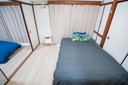 102Room,10-minute walk from Kita-Ikebukuro Station Spacious two-bedroom apartment with kitchen Sleeps up to 5 people