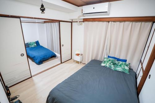 102Room,10-minute walk from Kita-Ikebukuro Station Spacious two-bedroom apartment with kitchen Sleeps up to 5 people