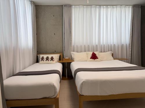 102Room,7-minute walk from Uguisudani Station located on the 1nd floor of an apartment-style building Twin room No elevator