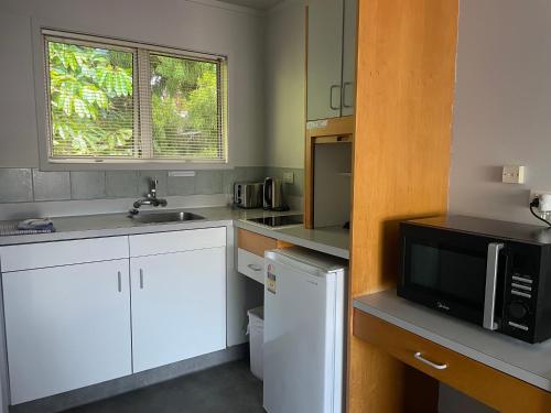 Cozinha, Aaron Court Motel Whangarei in Regent