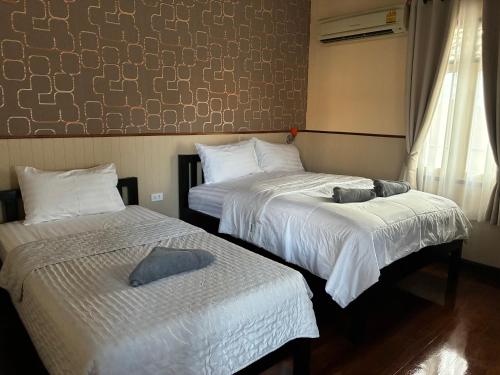 諾姆旅館 (Noom Guesthouse) in 華富里市中心