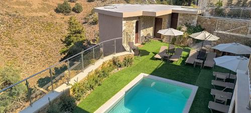 Achlades The Mountain Paradise Villas - Suite with a Private Jacuzzi, Pool, and a Balcony with an Am in Keramies