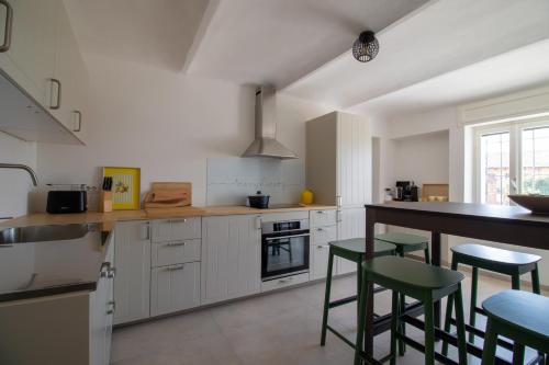 Iekārtas, Casa all'angolo in Rocchetta Tanaro