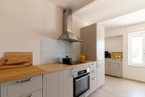 Iekārtas, Casa all'angolo in Rocchetta Tanaro