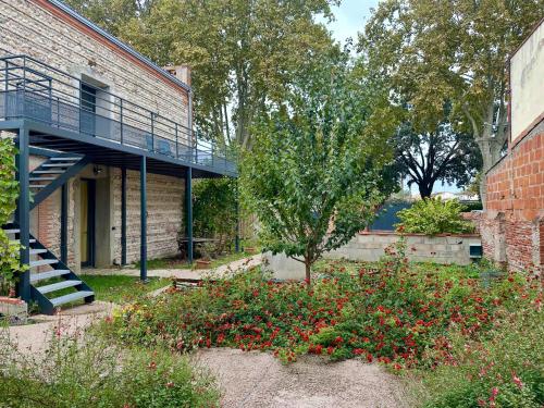Dārzs, Évasions-Escapade, centre-ville, gare (Evasions-Escapade, centre-ville, gare) in Auterive (Midi-Pyrenees)
