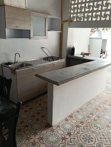 Casa familiar con piscina privada in Agua de Dios