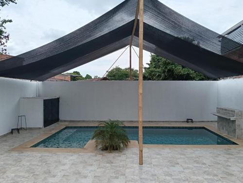 Casa familiar con piscina privada in Agua de Dios