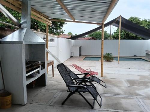 Casa familiar con piscina privada in Agua de Dios