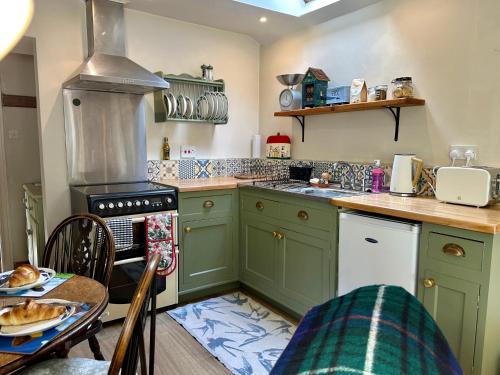 The Old Forge Glamping and Cottage Stays in Komptona Ebasa